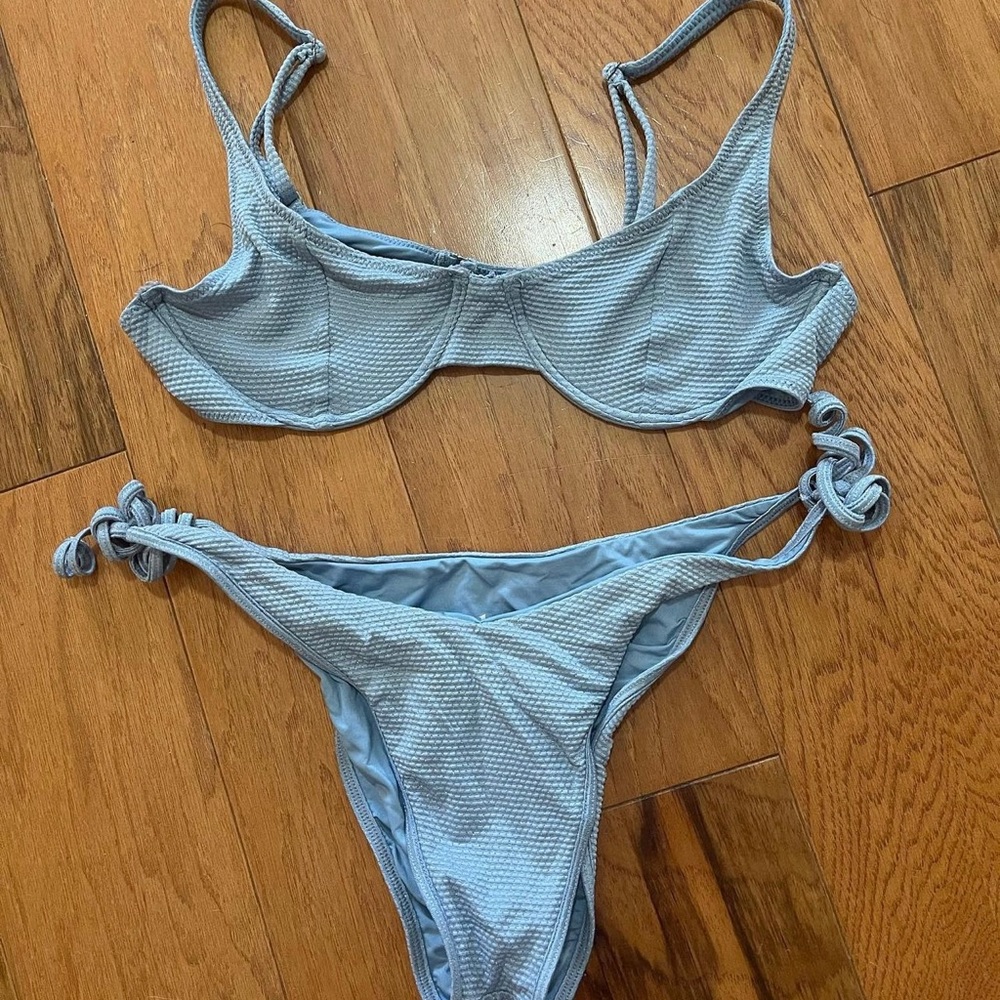 Frankie’s blue metallic bikini